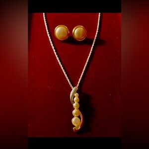 Genuine Pearl and Gold Jewelers made set new in box.